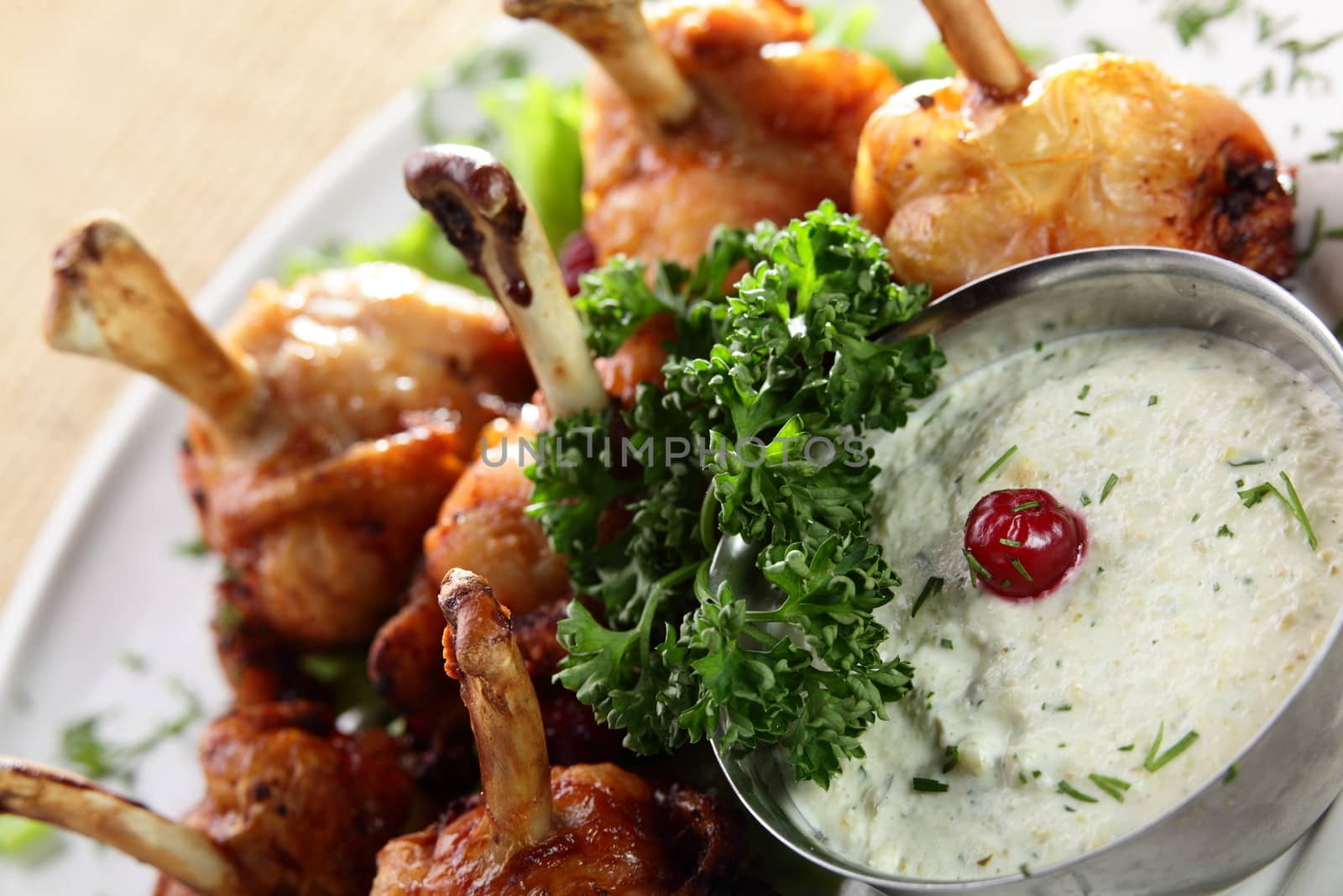 roasted chicken legs with sauce and berries