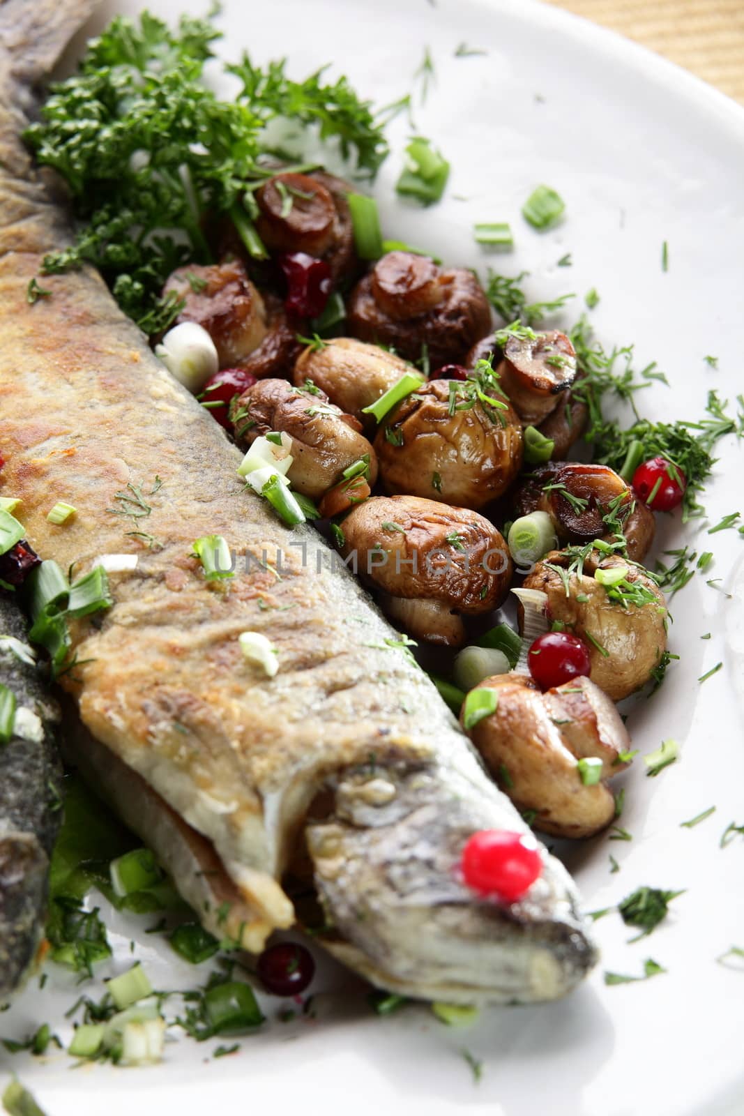 fish with mushrooms by fiphoto