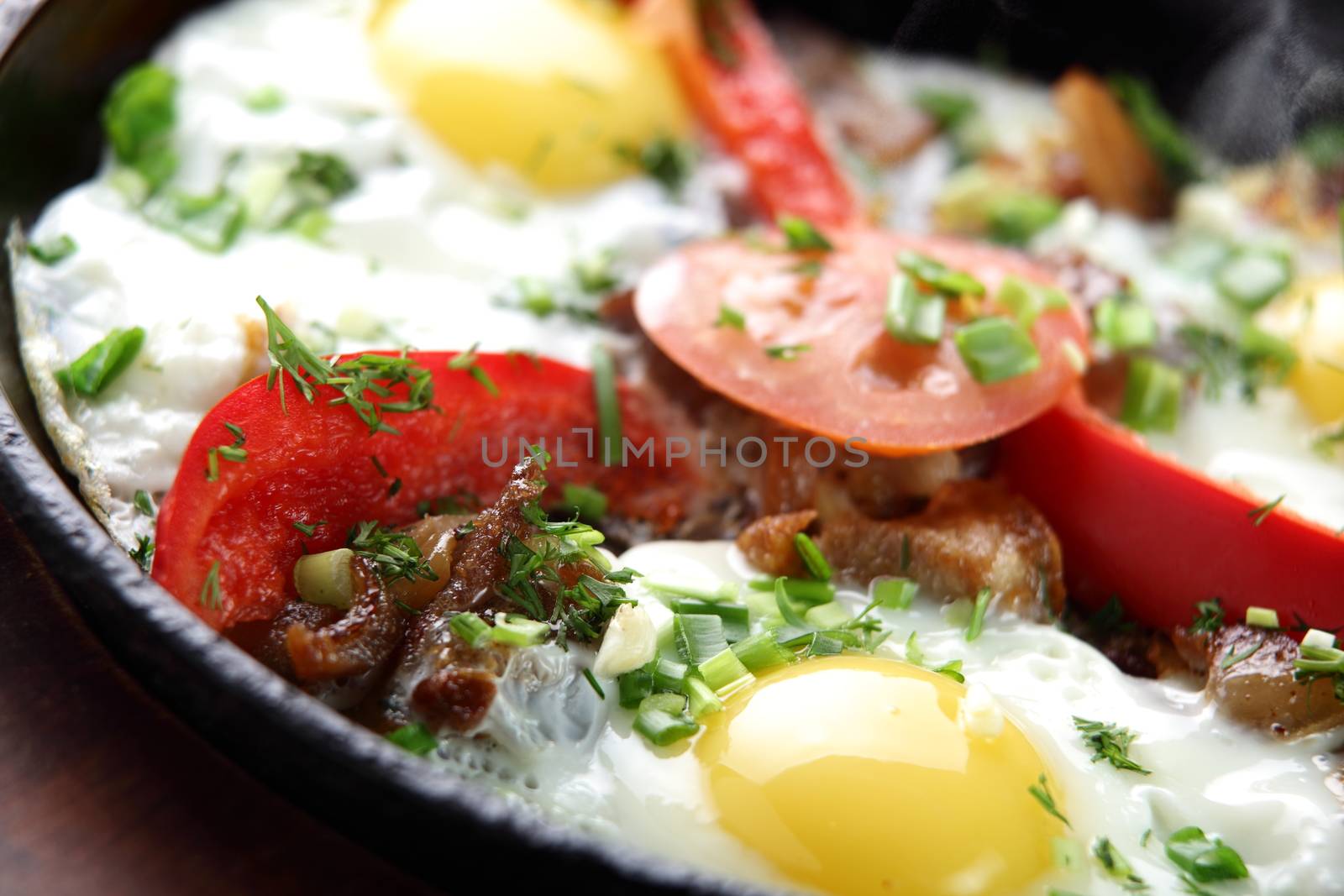 pan with eggs by fiphoto