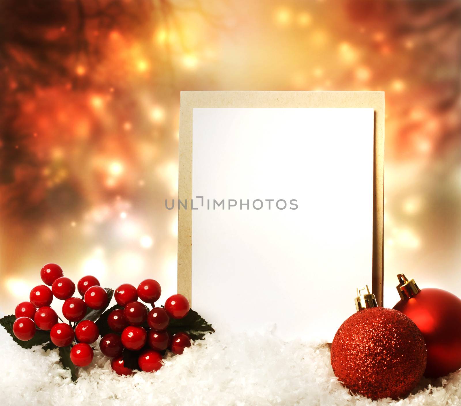 Blank Christmas card with red ornaments at night