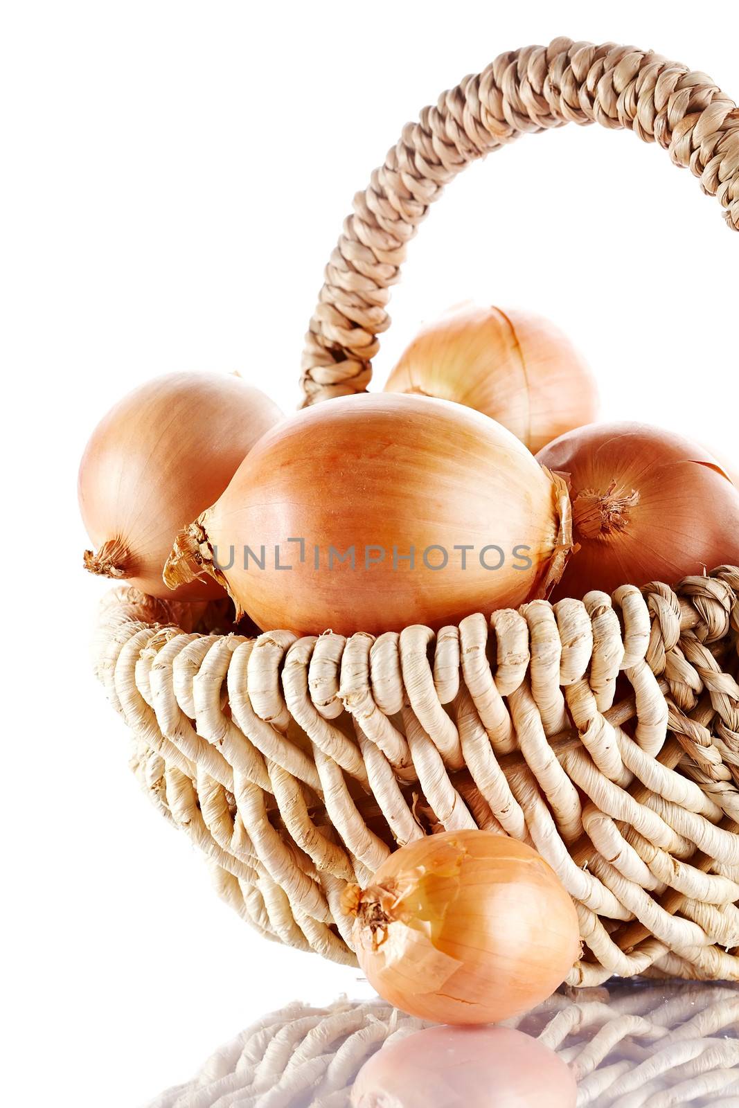 Onions napiform in a wattled basket. Onions napiform. Vegetables in a basket.