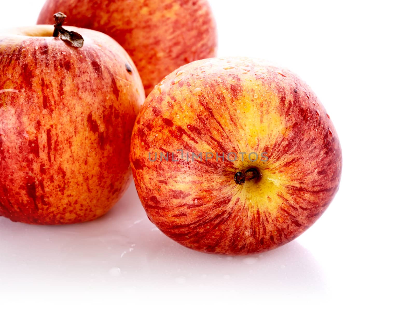 Three red apples. Useful fruit. Healthy food. Vegetarian food