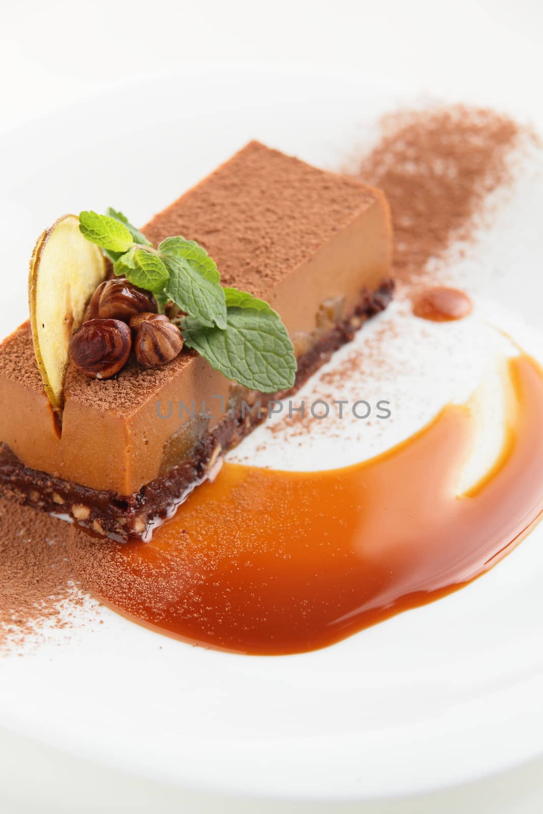 fresh and tasty cake on white dish and white background