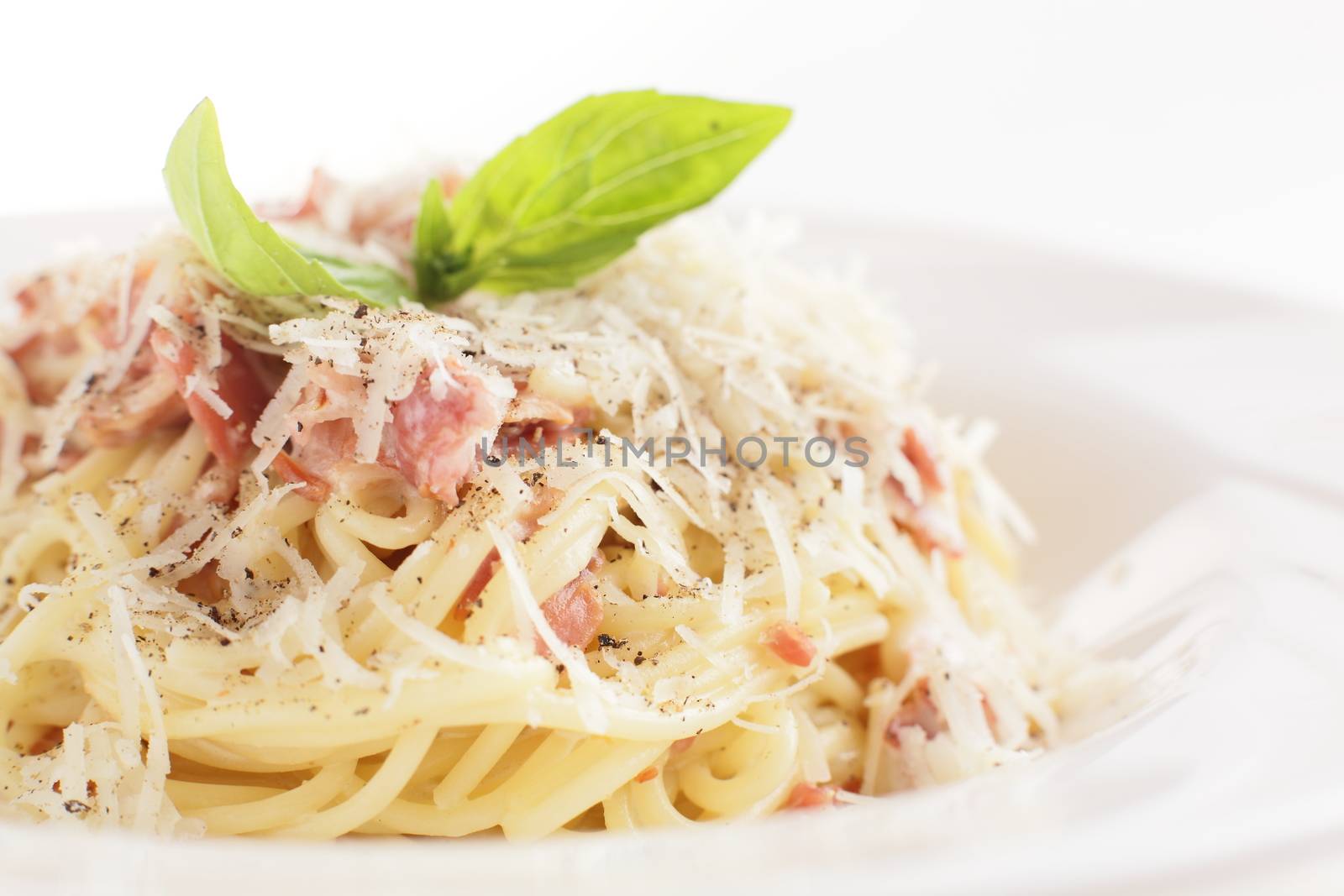 hot pasta with fresh basil by fiphoto