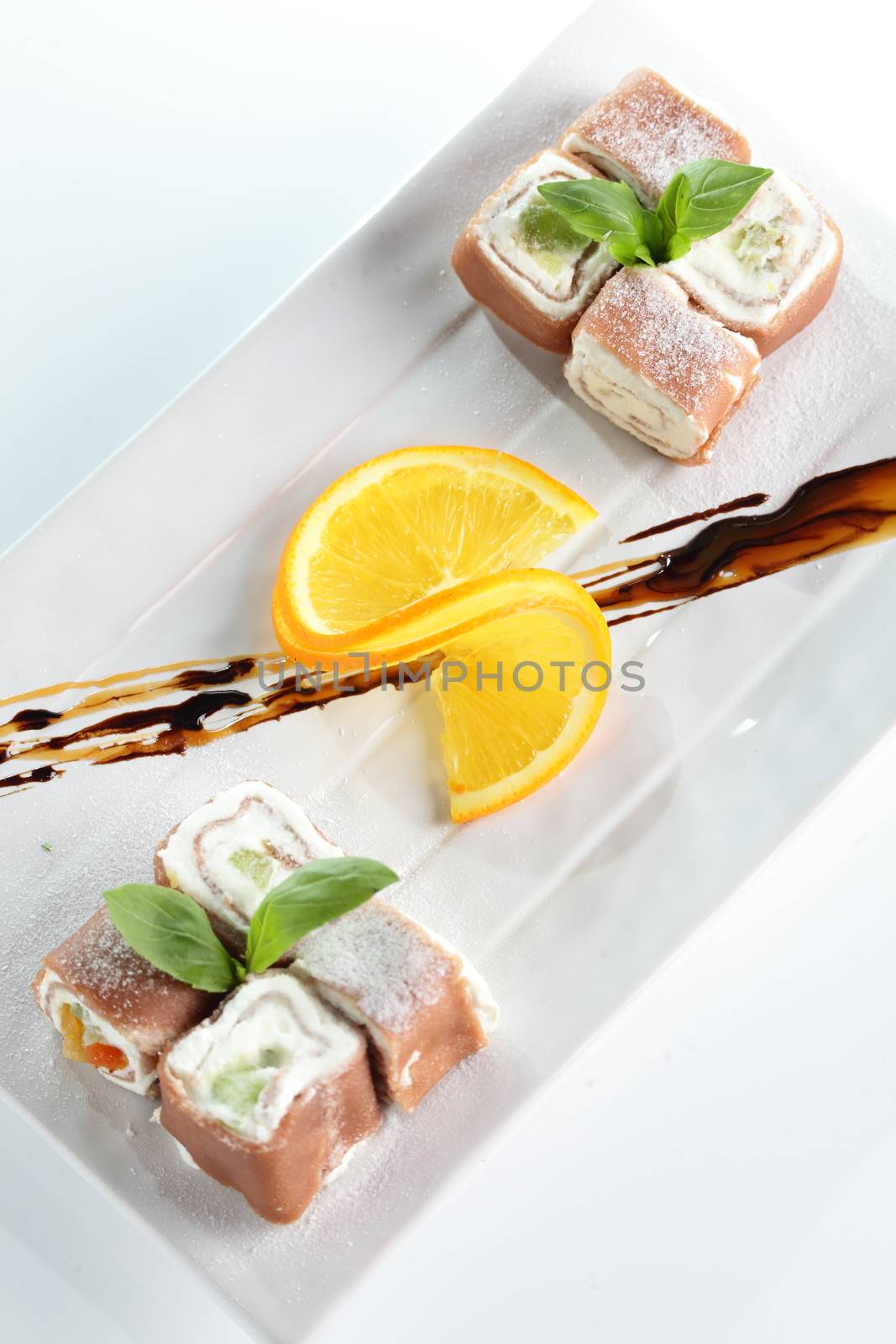 fresh and tasty sushi on bright background