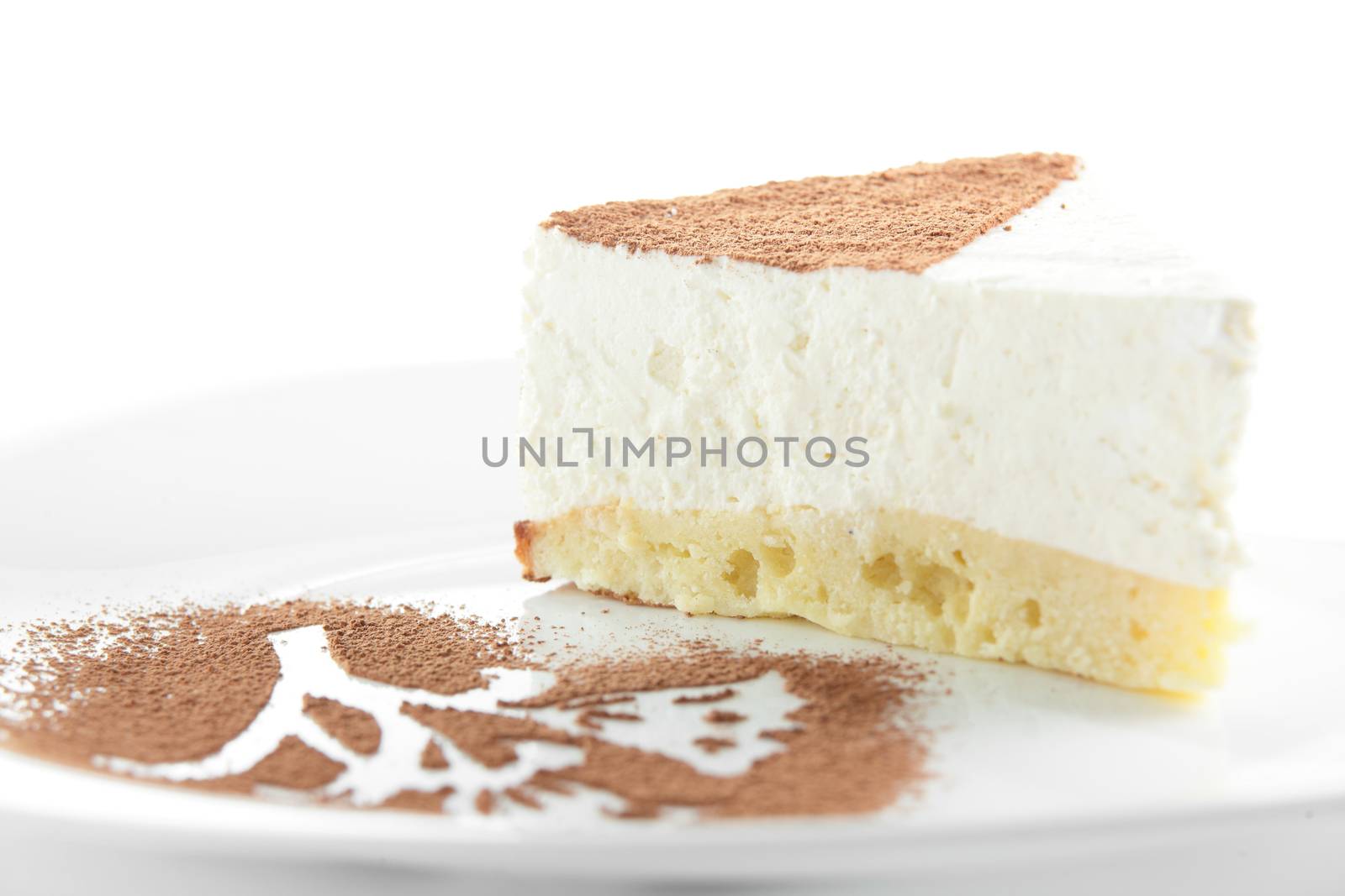 Peace of cake on white dish and white background