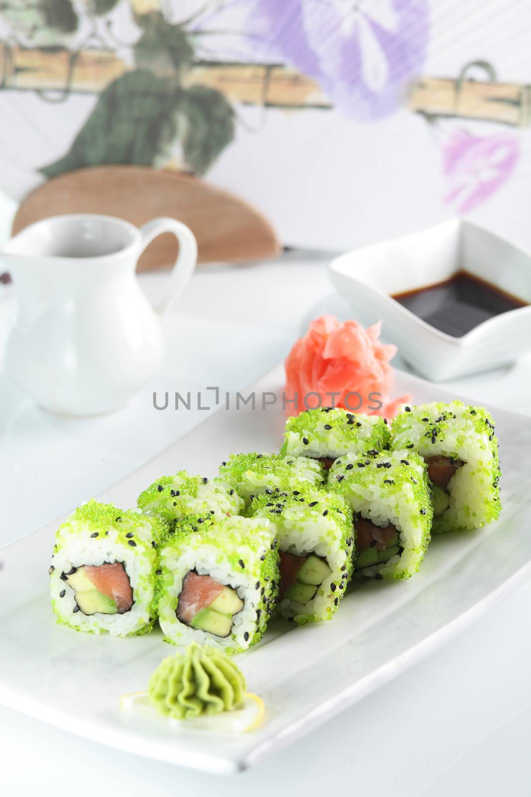 fresh and tasty sushi on bright background