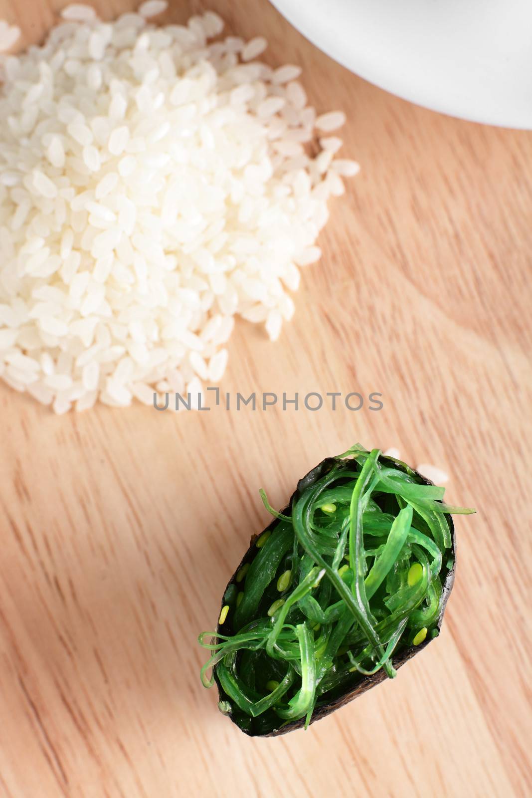 fresh and tasty sushi on bright background