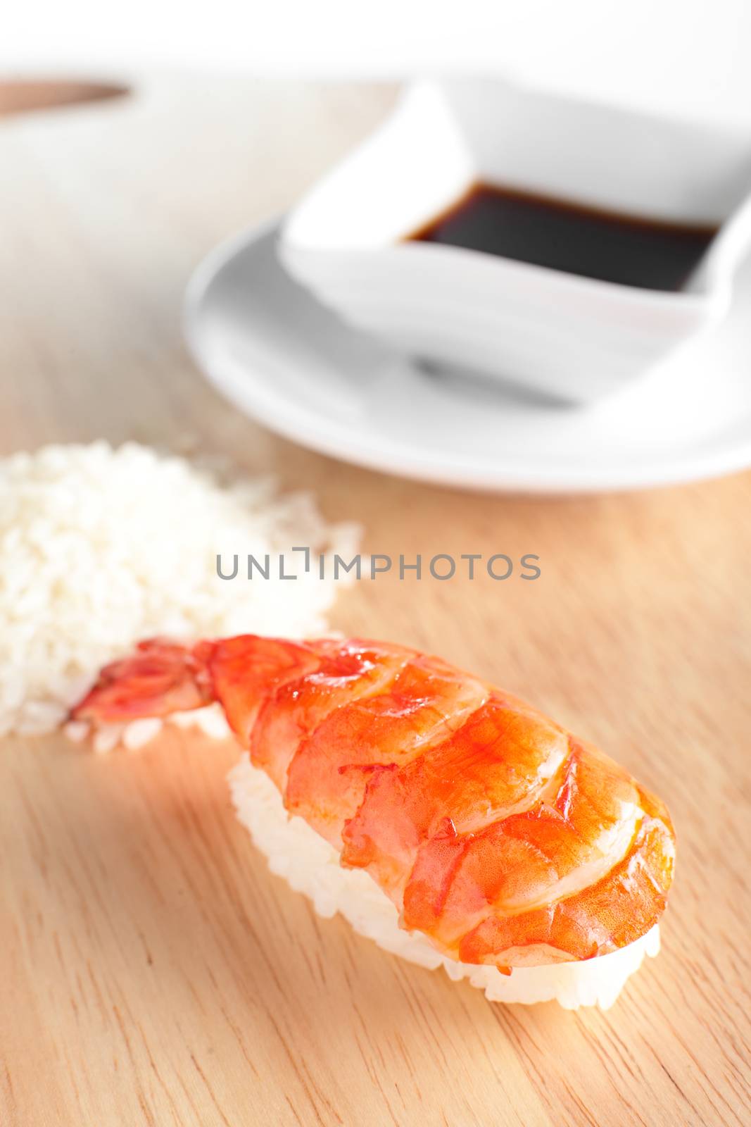 fresh and tasty sushi on bright background