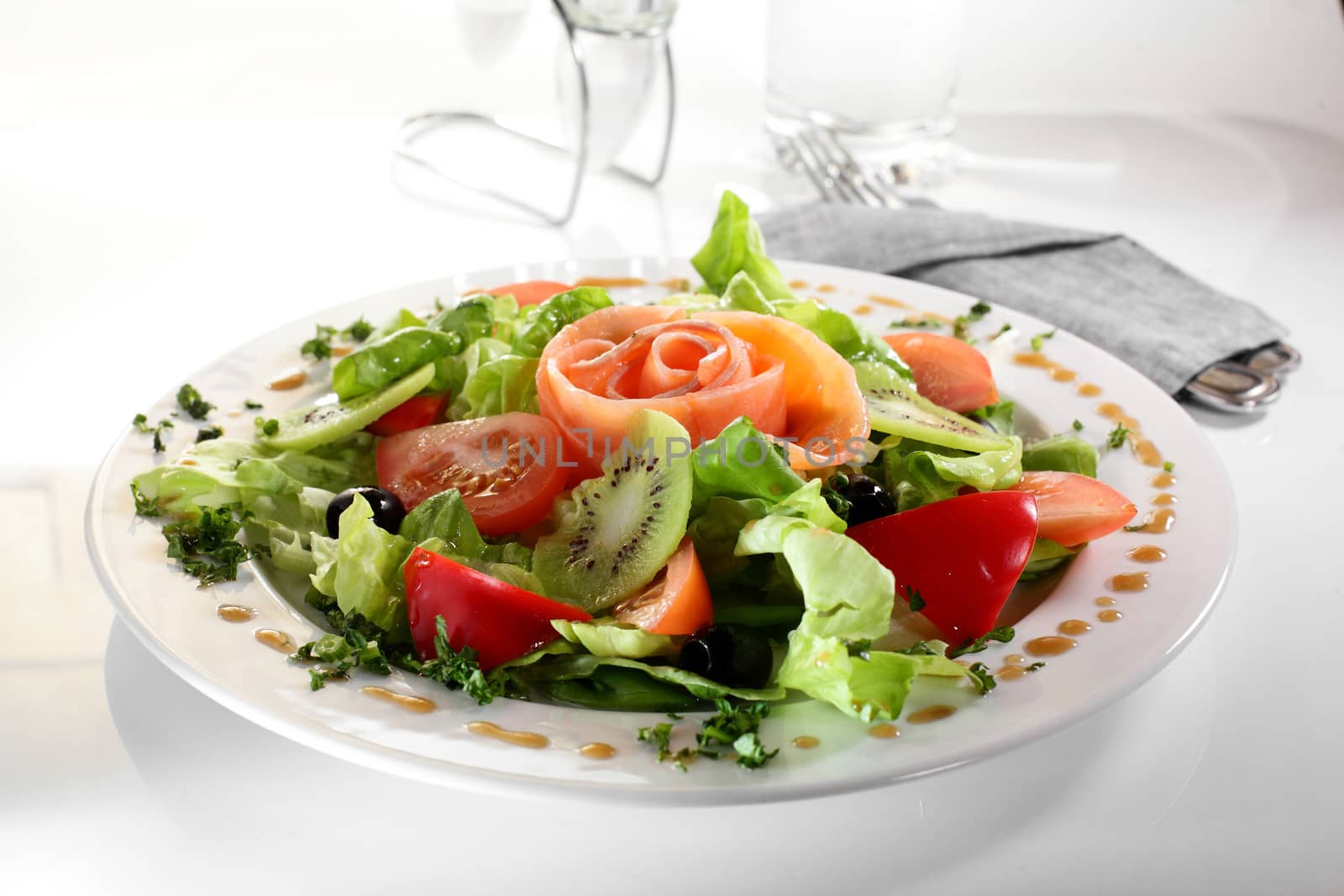 fresh salad with tasty garnish by fiphoto