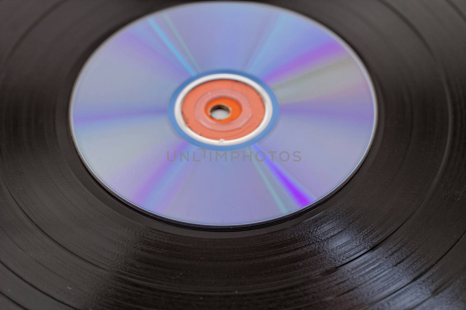 vinyl record  disk and CD (Compact disk) on white background