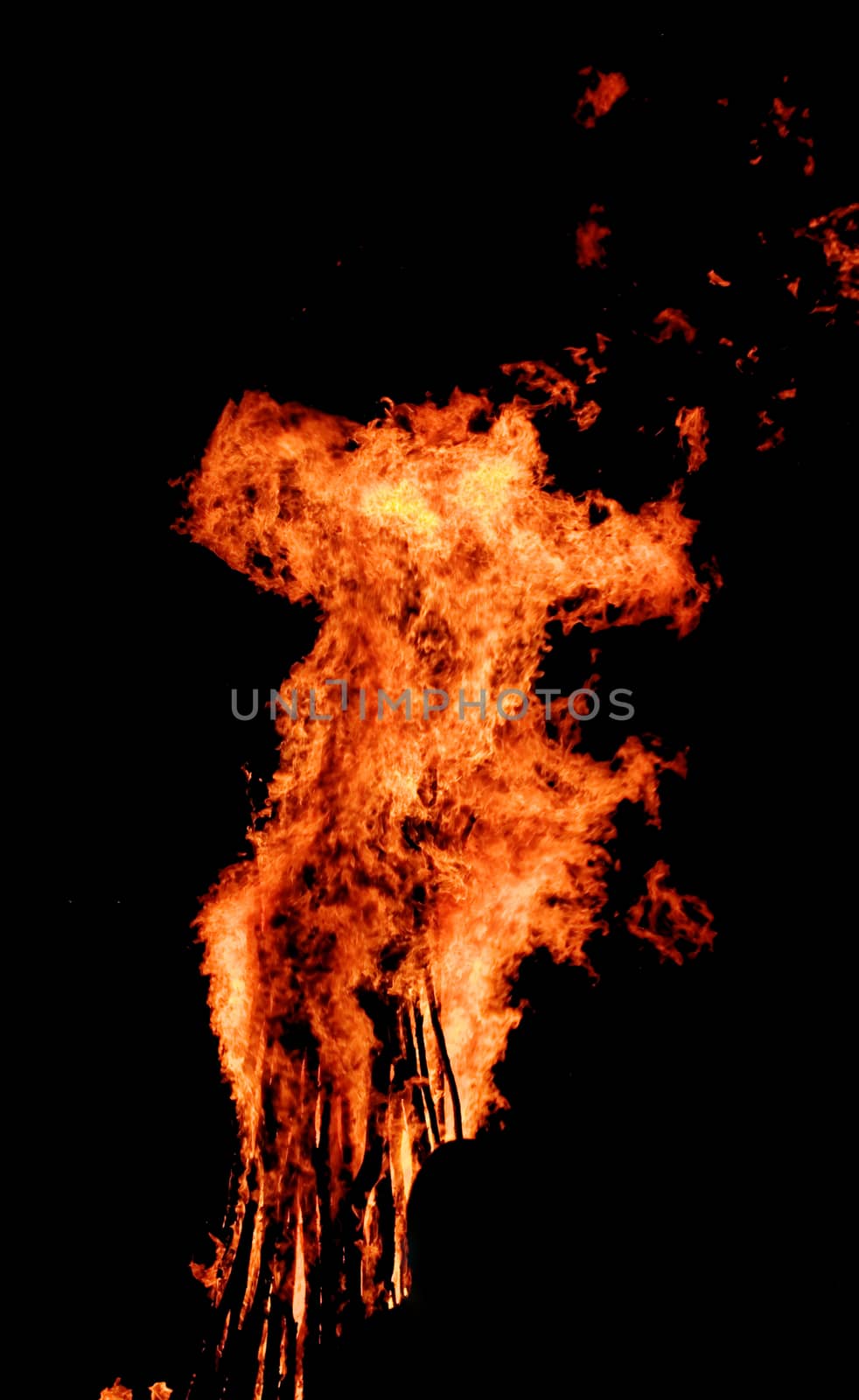 red flames of huge bonfire or campfire as black backgorund