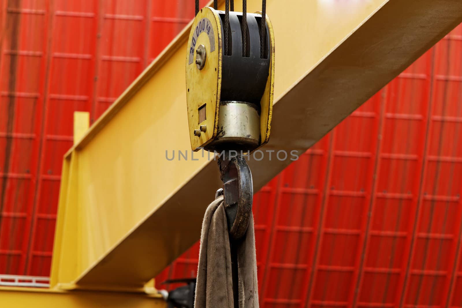 industrial crane hook with wire rope holding the load