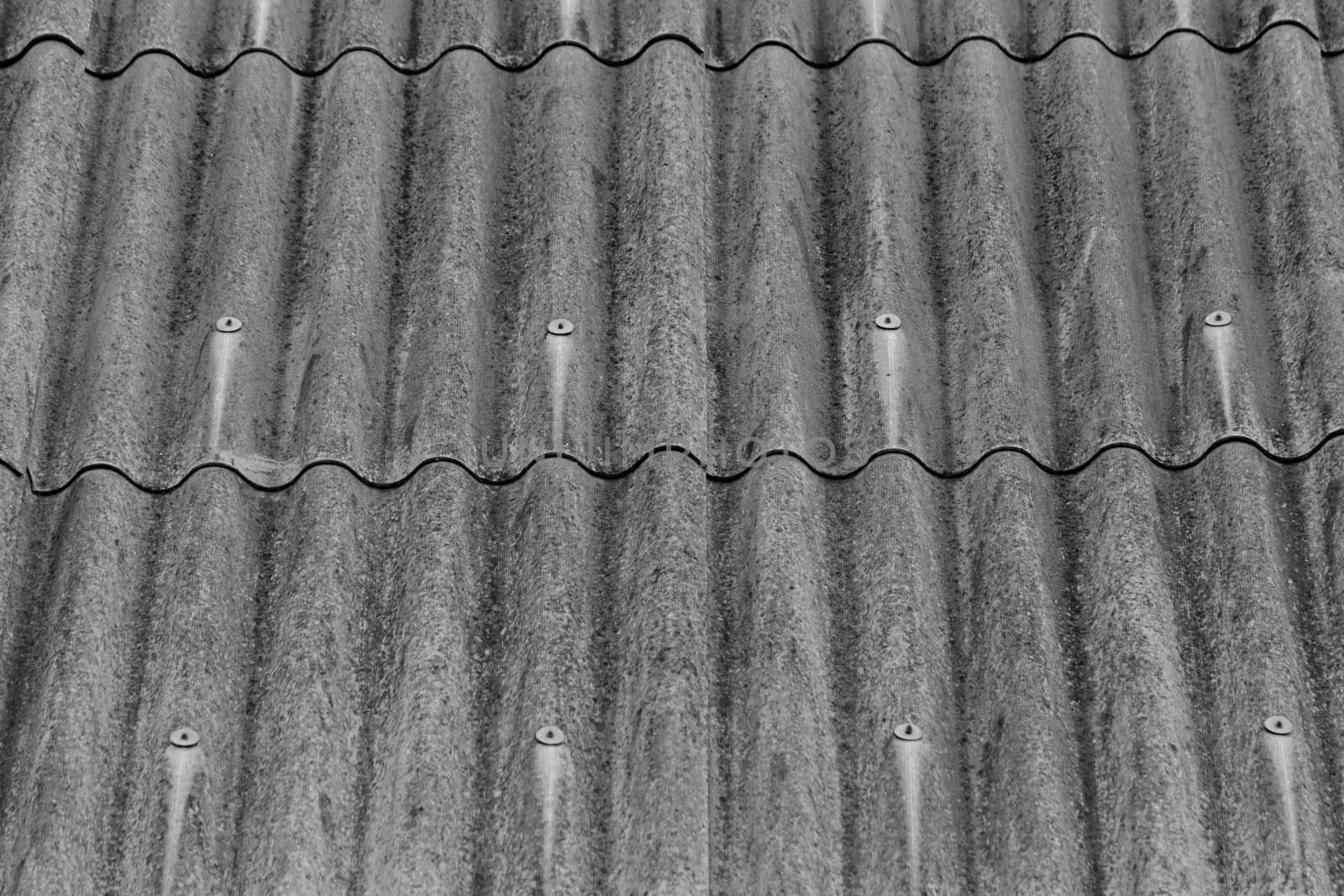 monochrome texture of gray corrugated slate roof