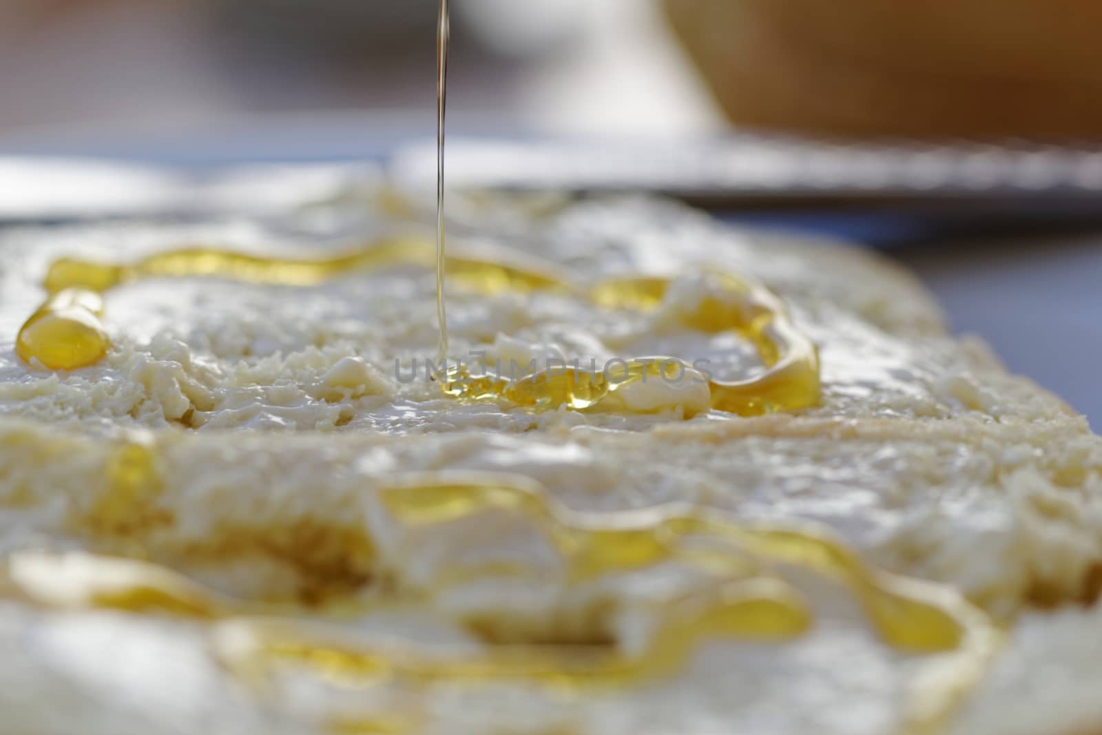 bread with honey and butter as breakfast