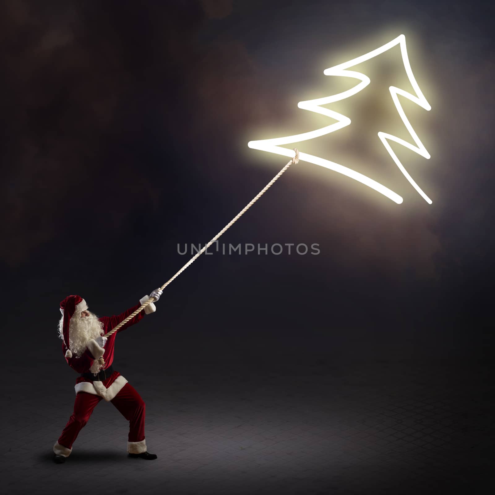 Santa Claus pulls a glowing symbol of the Christmas tree with a rope