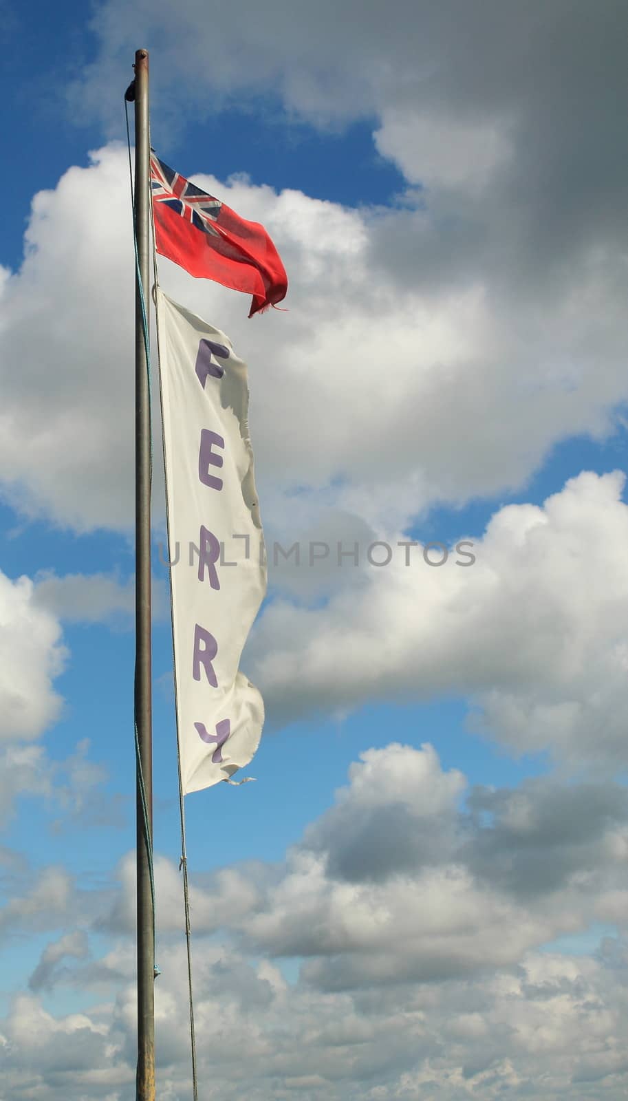 Image of a commuter ferry flag, flying in a storm with clouds