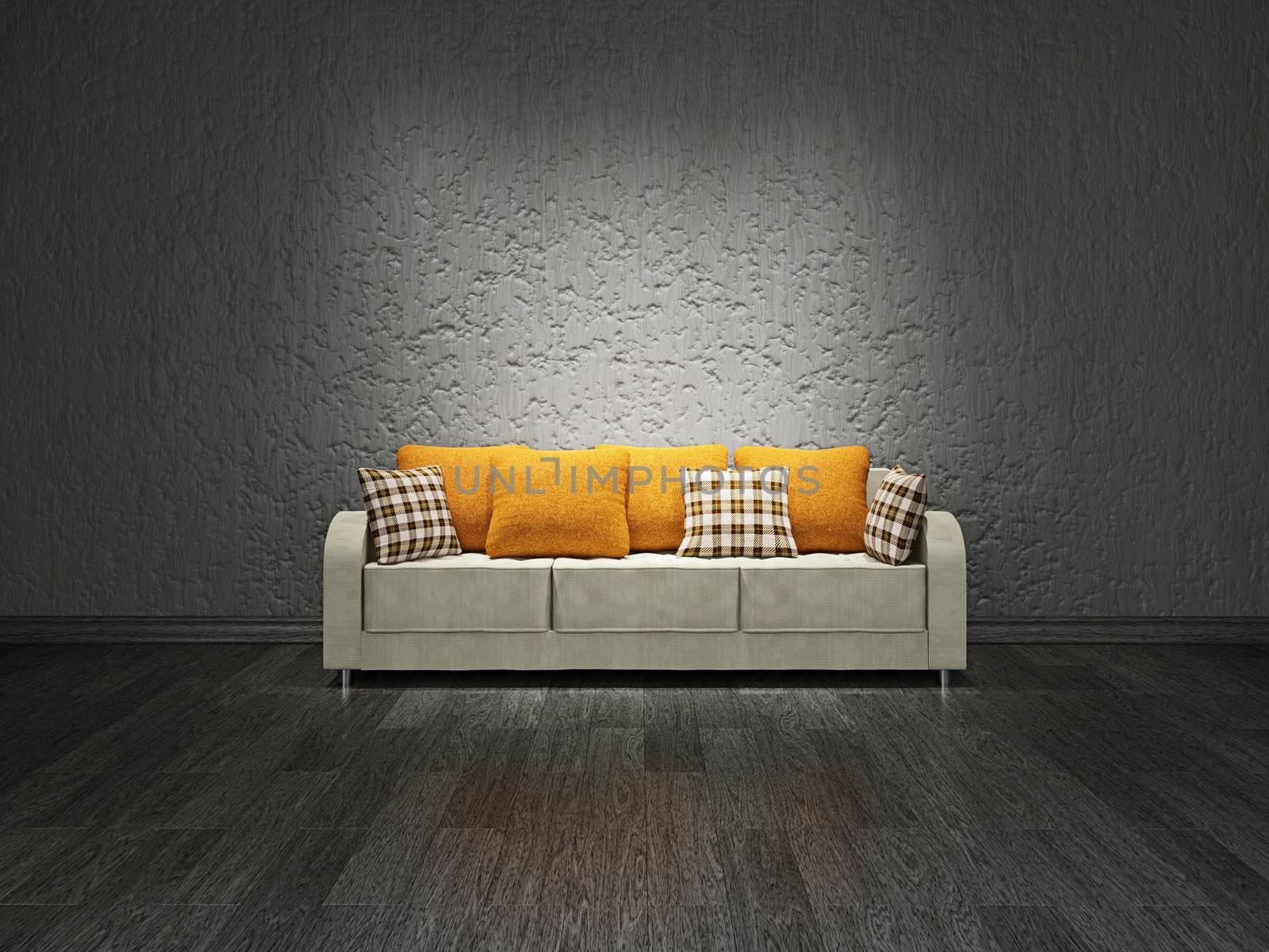 Sofa with pillows near the concrete wall