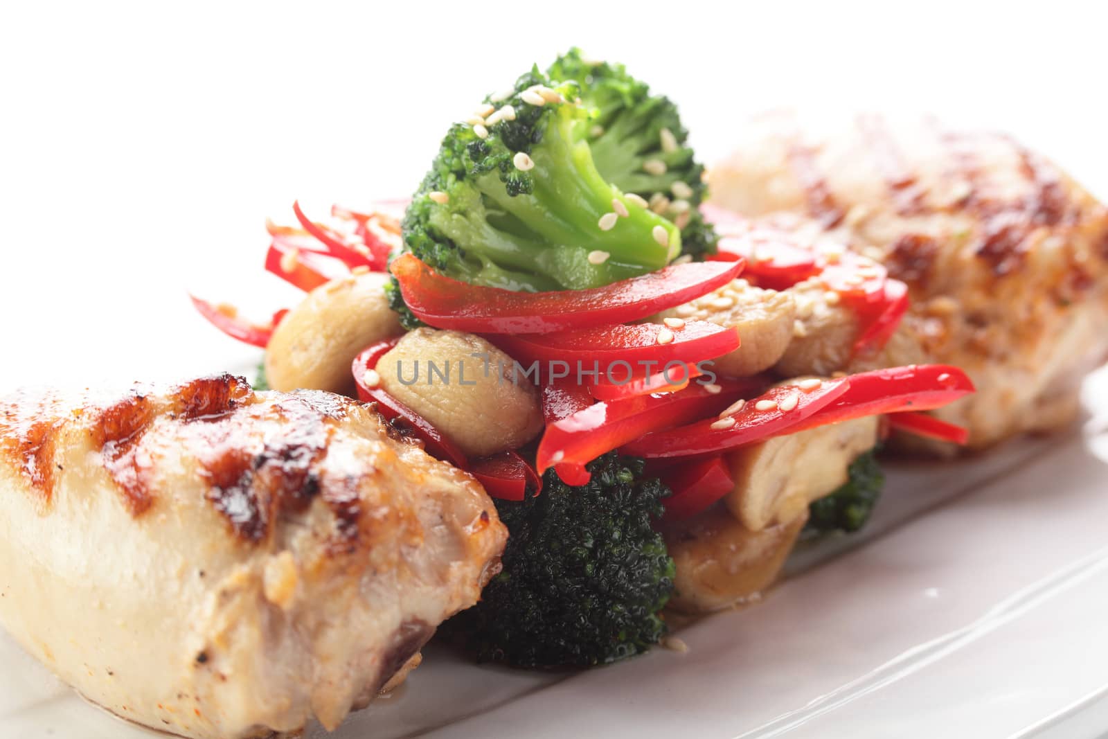 hot roasted chicken with pepper on white background