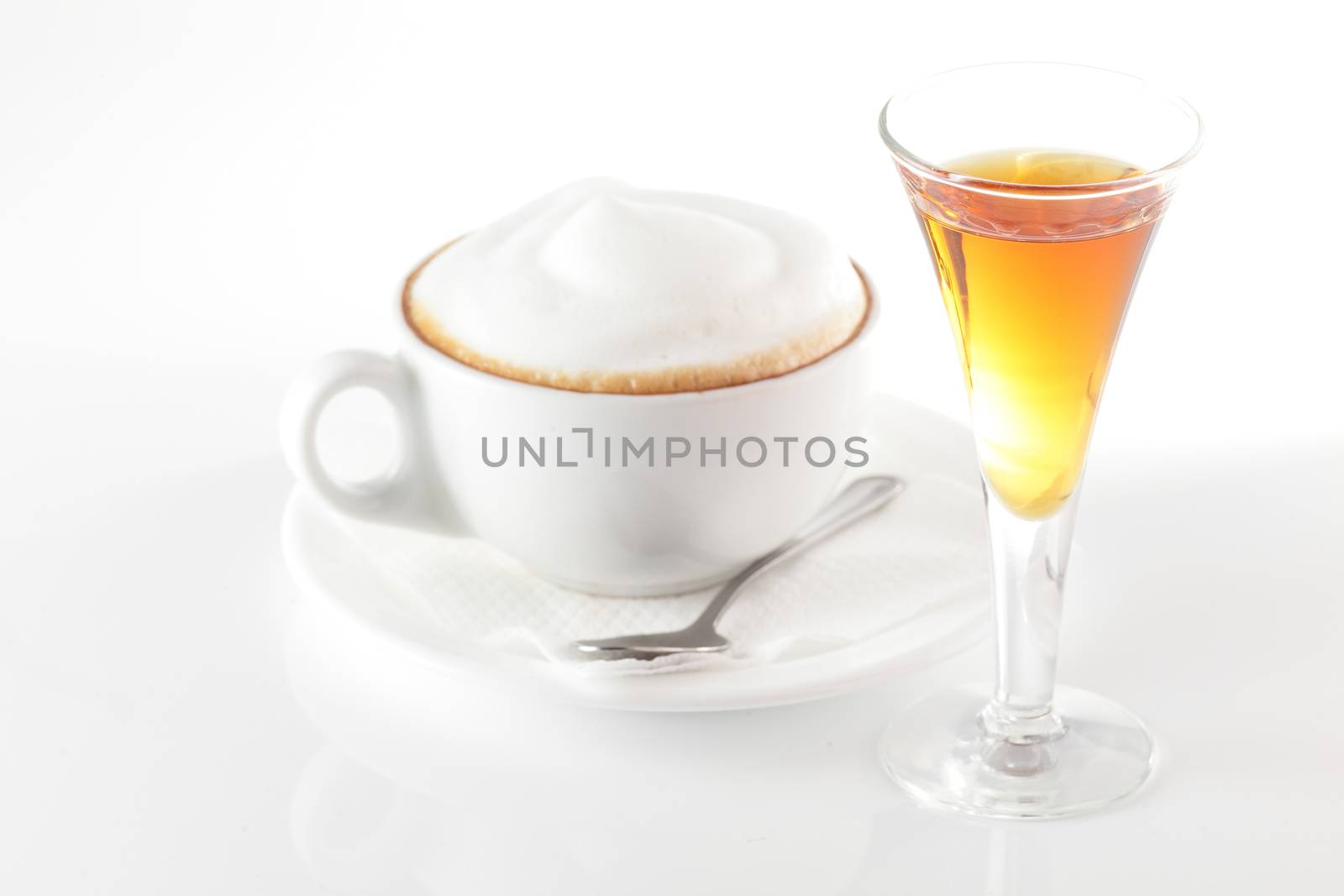 white cup of coffee on white background