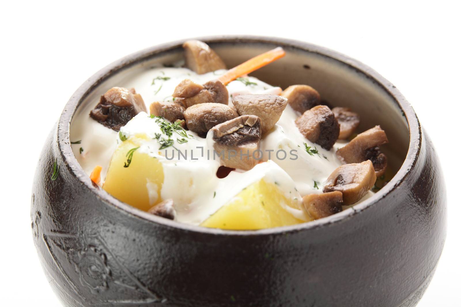hot roasted meat with pancake and mushrooms on white background