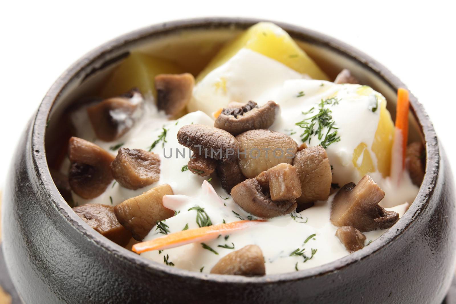 hot roasted meat with pancake and mushrooms on wooden desk