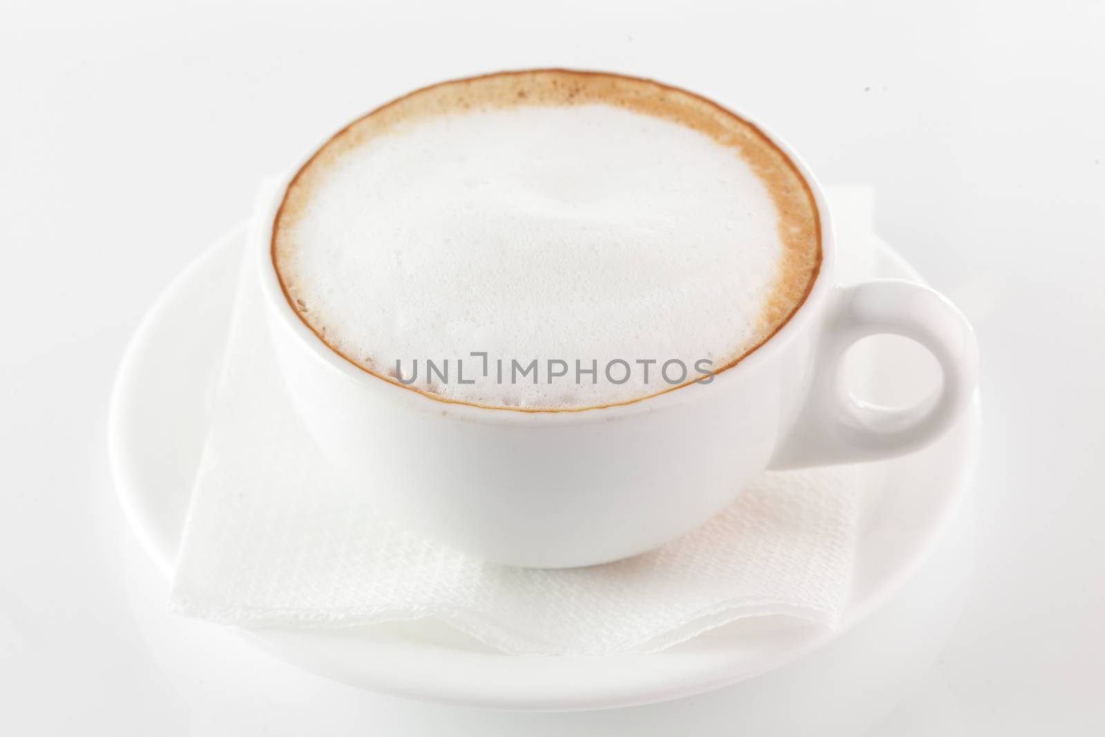 white cup of coffee on white background