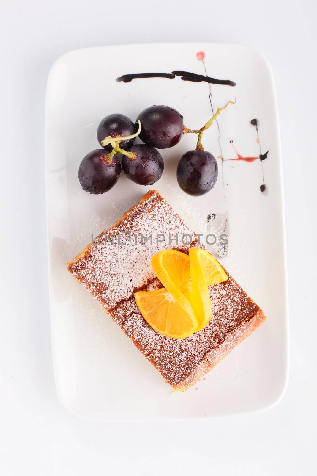 fresh and tasty cake on white background