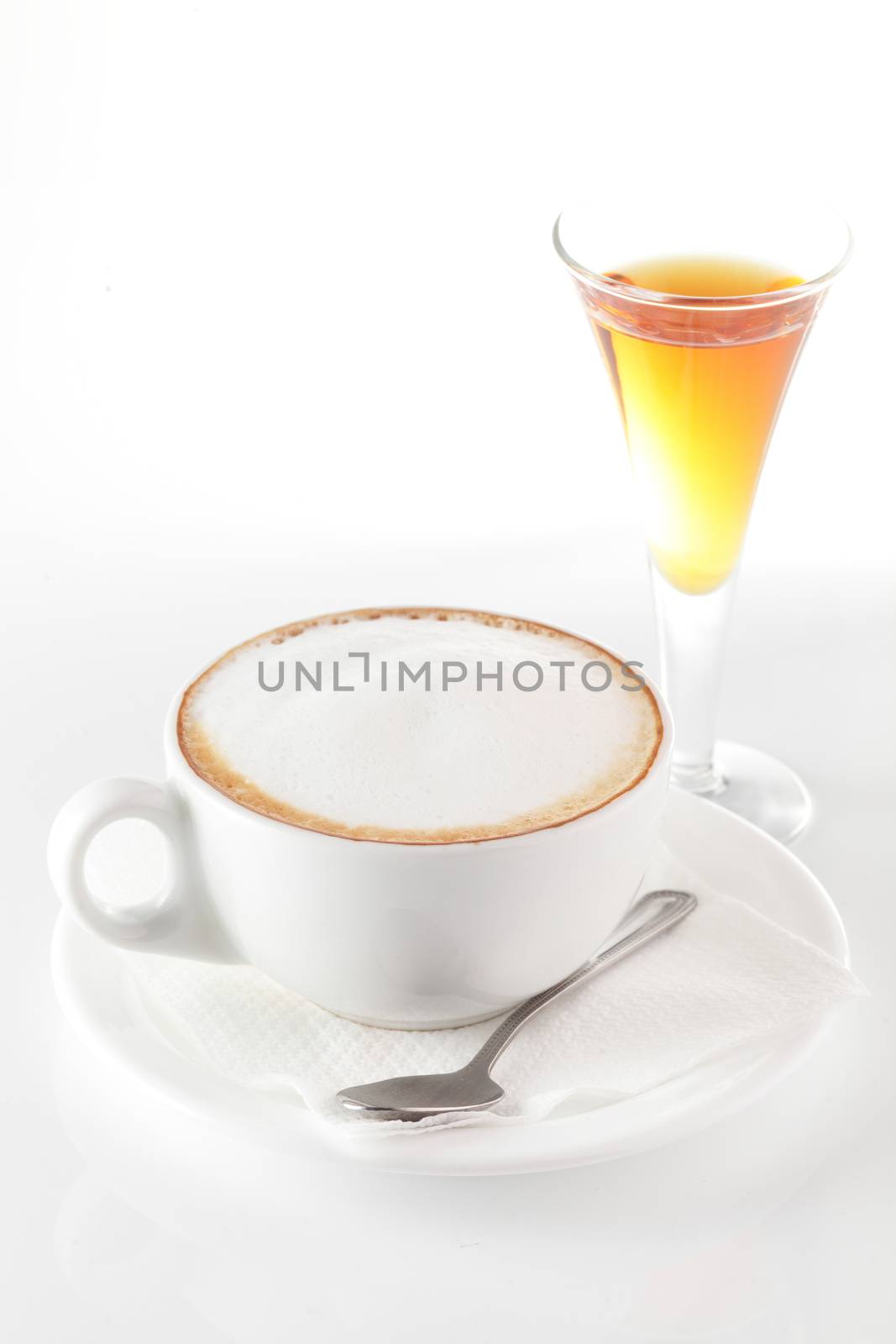 white cup of coffee on white background