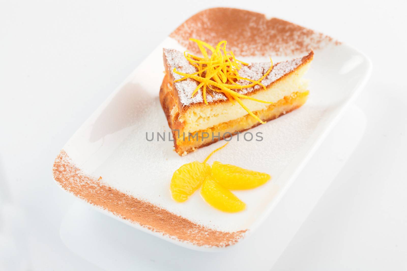tasty cake on the dish by fiphoto
