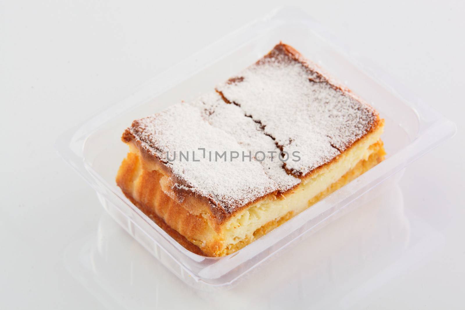 fresh and tasty cake on white background