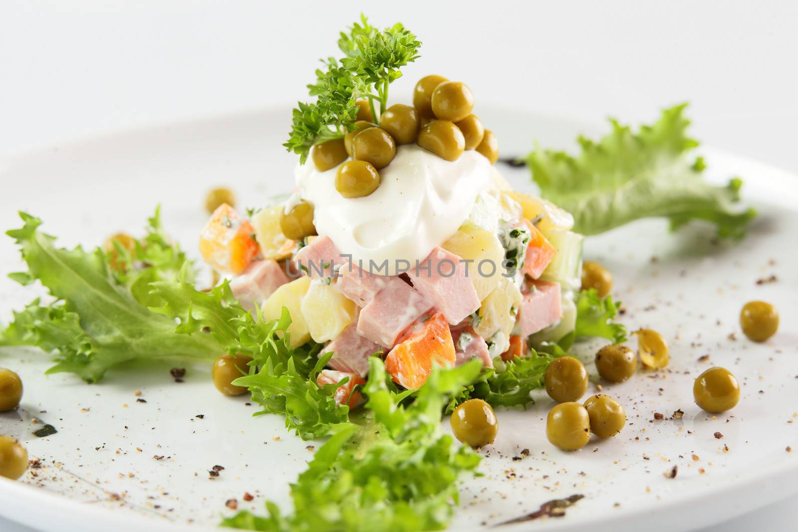 fresh summer salad on white background by fiphoto