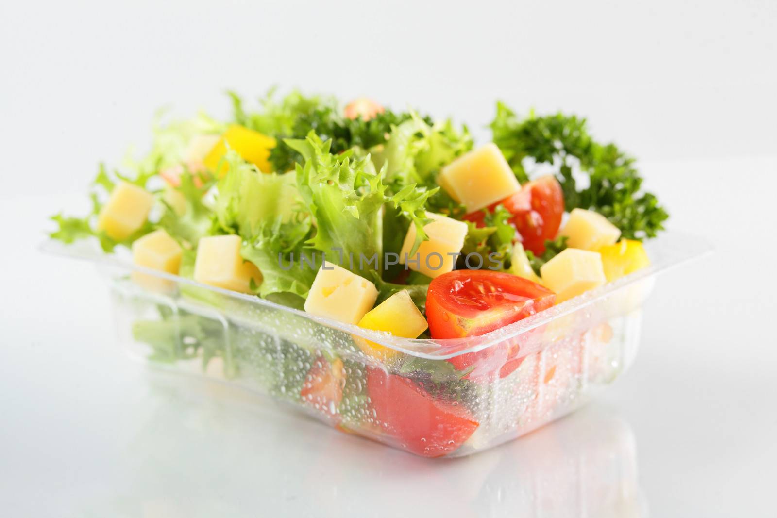 fresh and tasty salad on white background