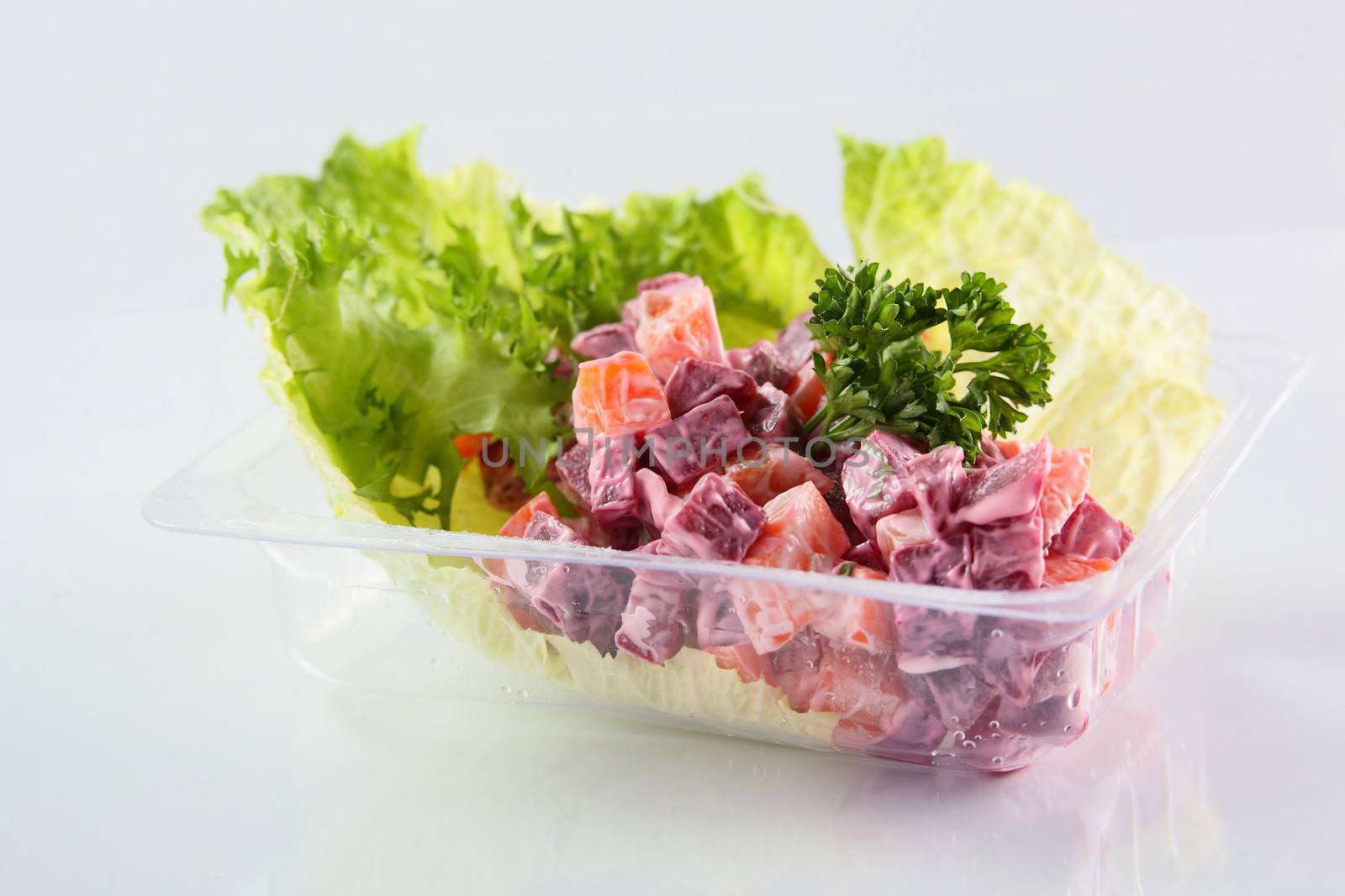 fresh and tasty salad on white background