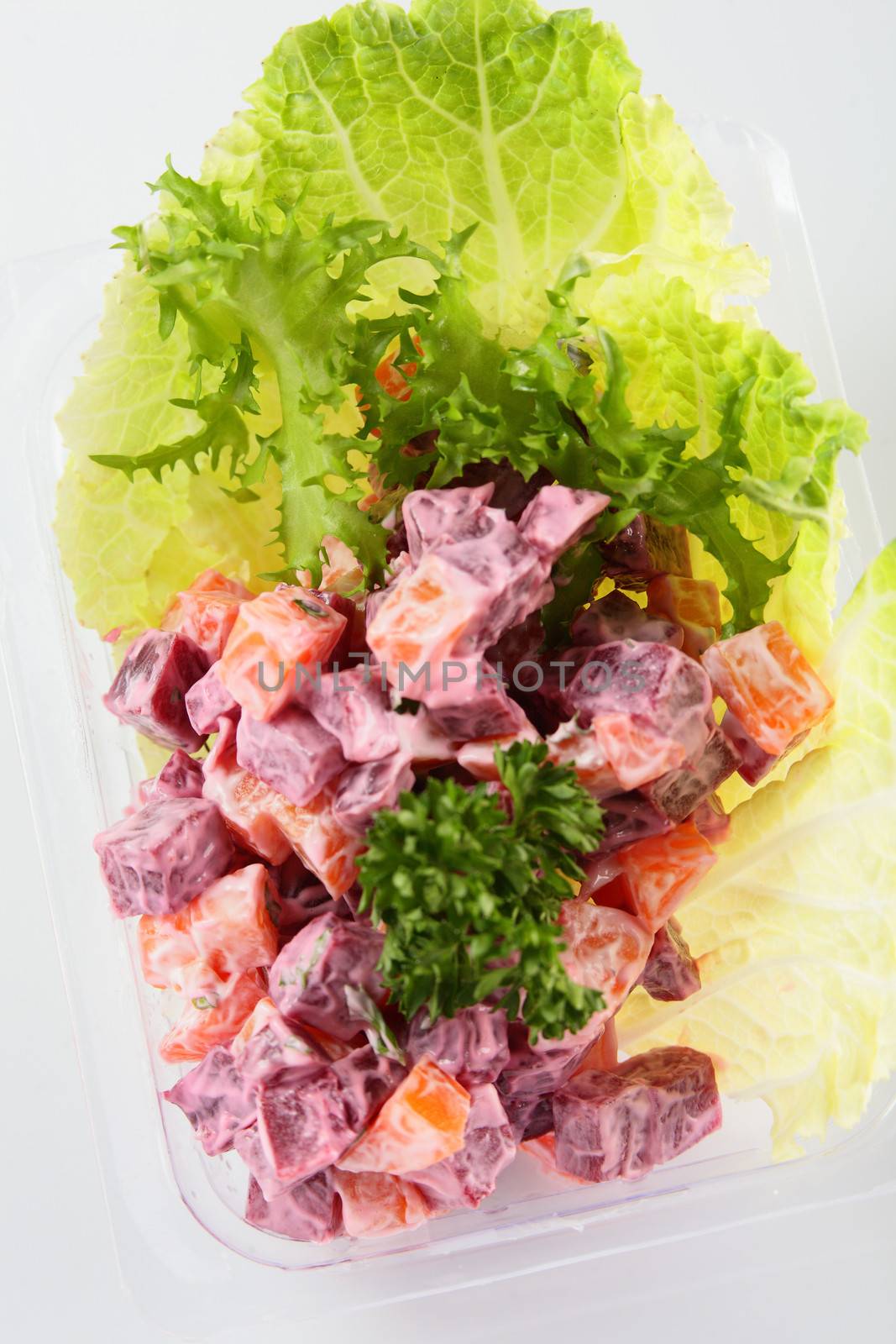 fresh summer salad on white background by fiphoto