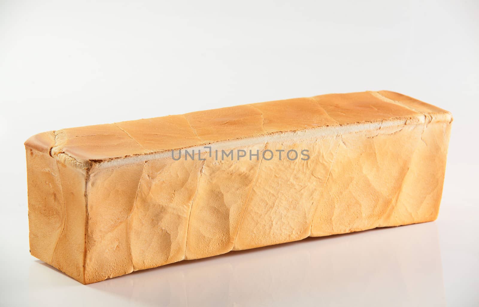 fresh and tasty bread on white background