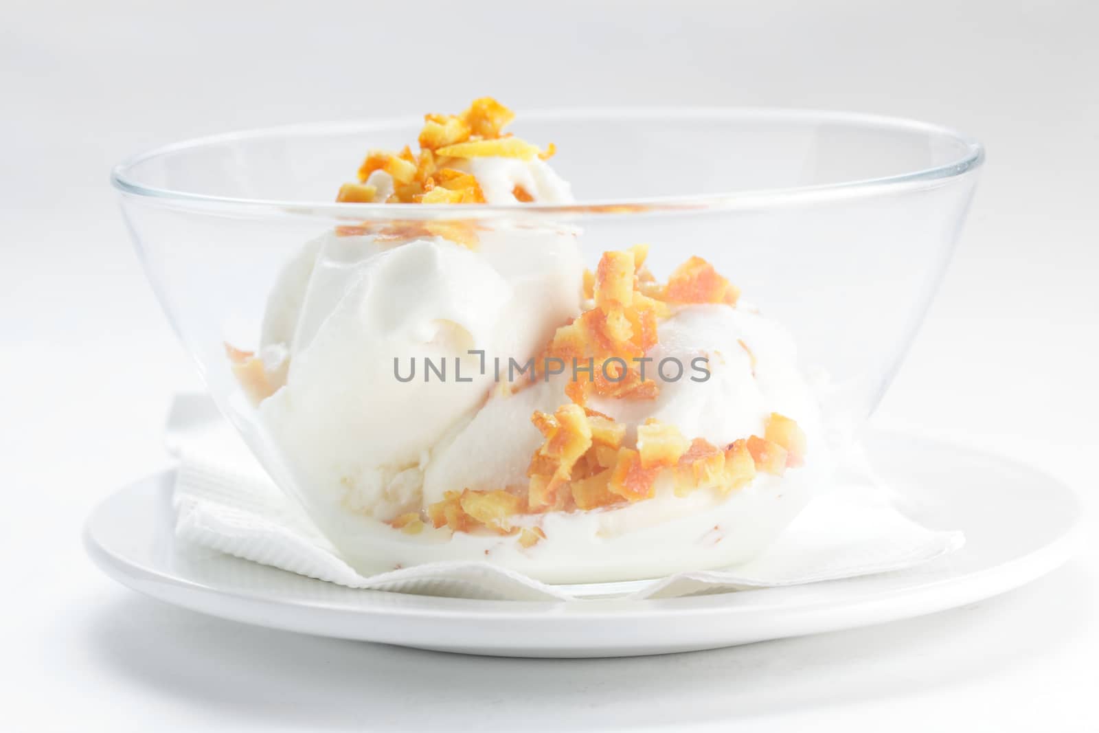 cold ice cream on transparent dish by fiphoto