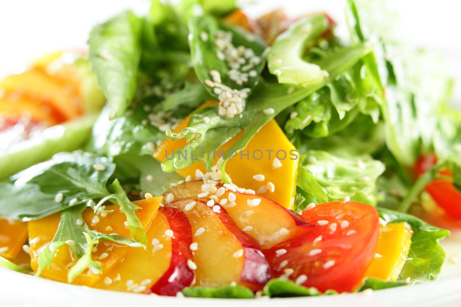 fresh and tasty salad on white background