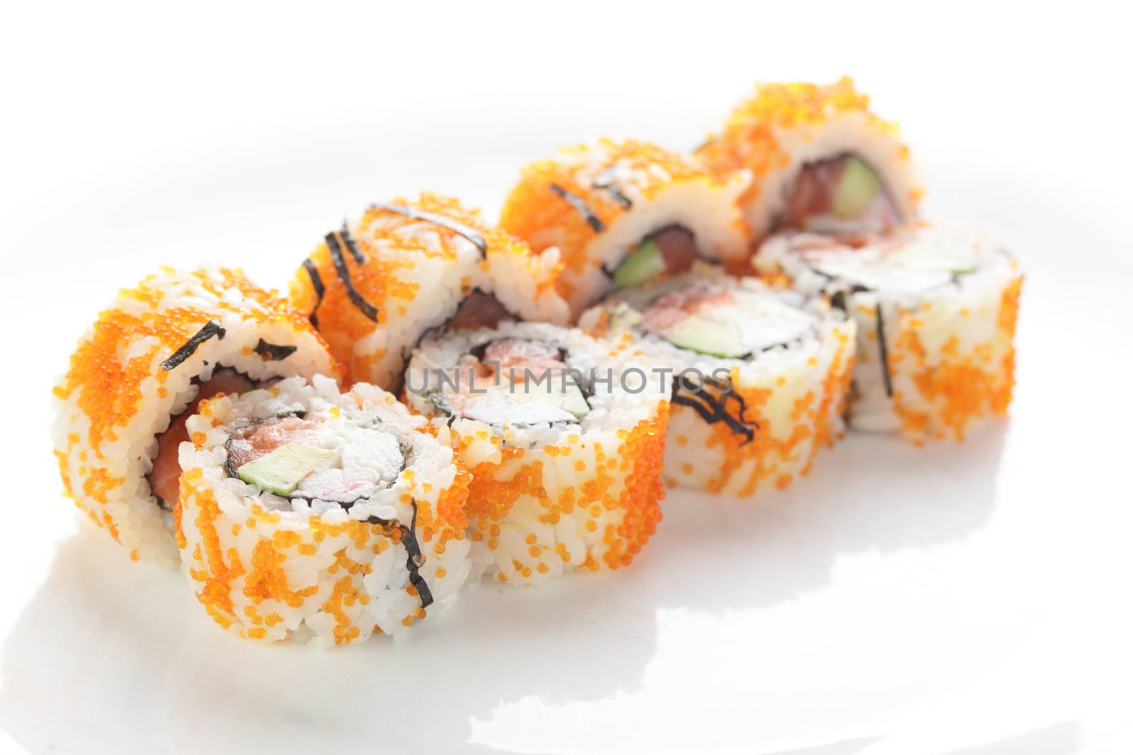 fresh and tasty sushi on white background