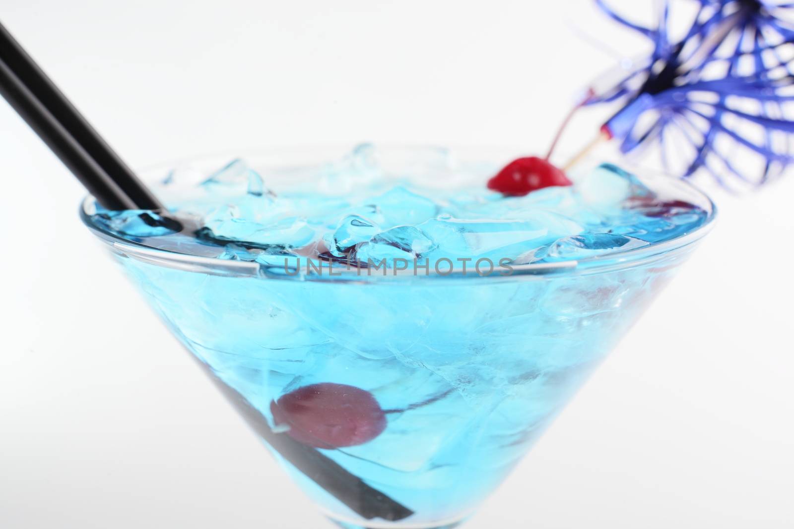 cold and tasty cocktail on white background