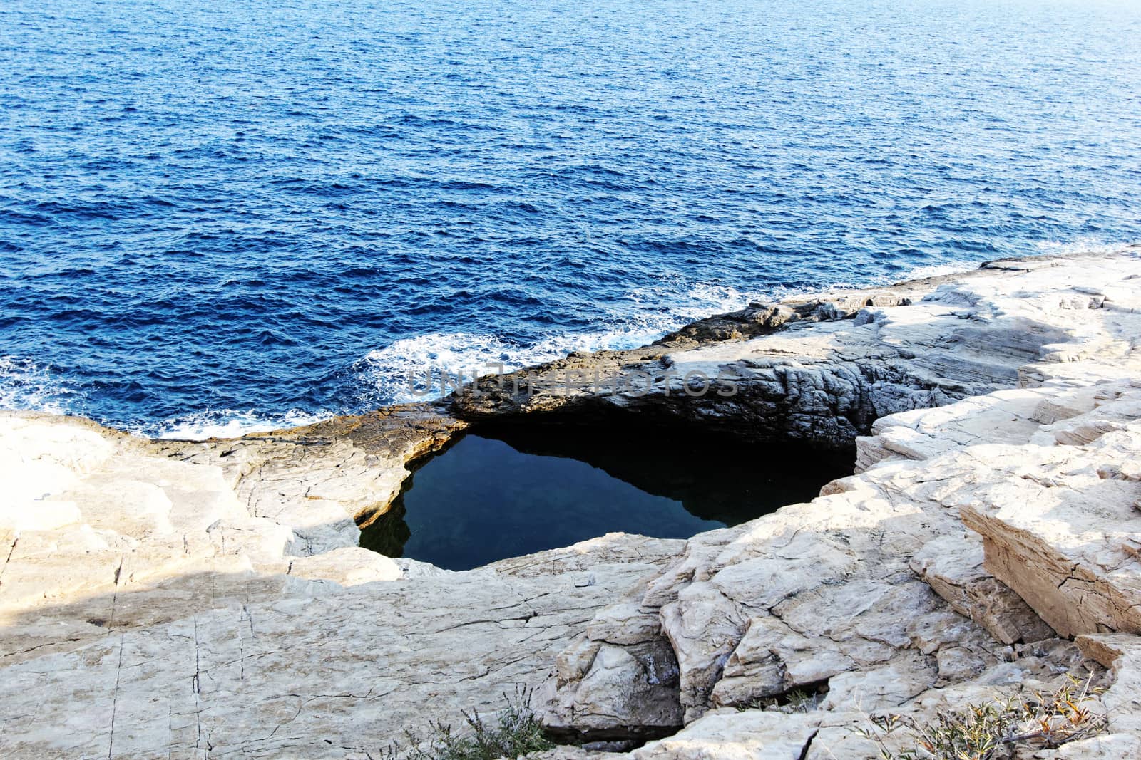 rocky beach and natural pool in greece thassos by NagyDodo