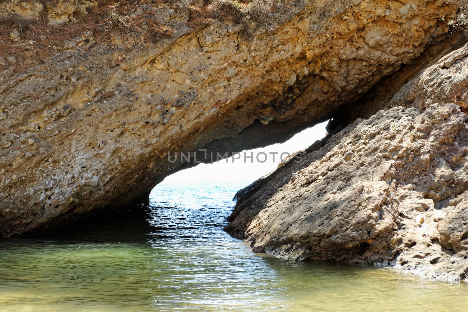 tripiti rocky beach with turquise sea on greece thassos island