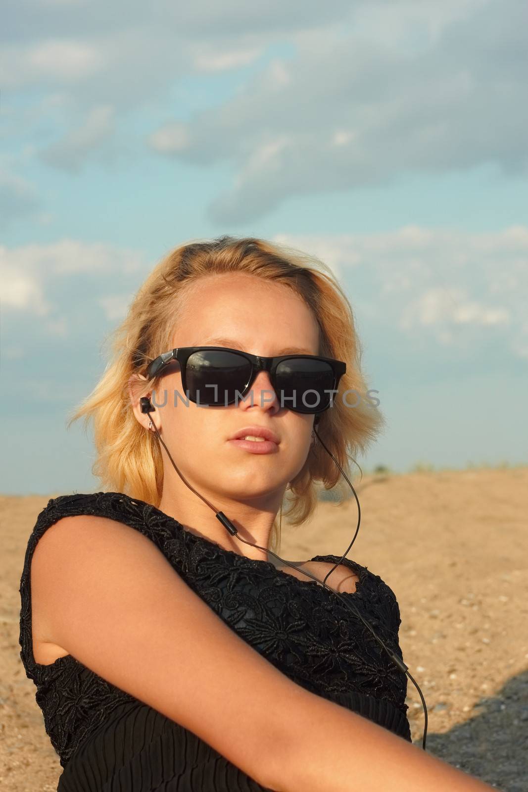 Teenage girl on the beach by qiiip