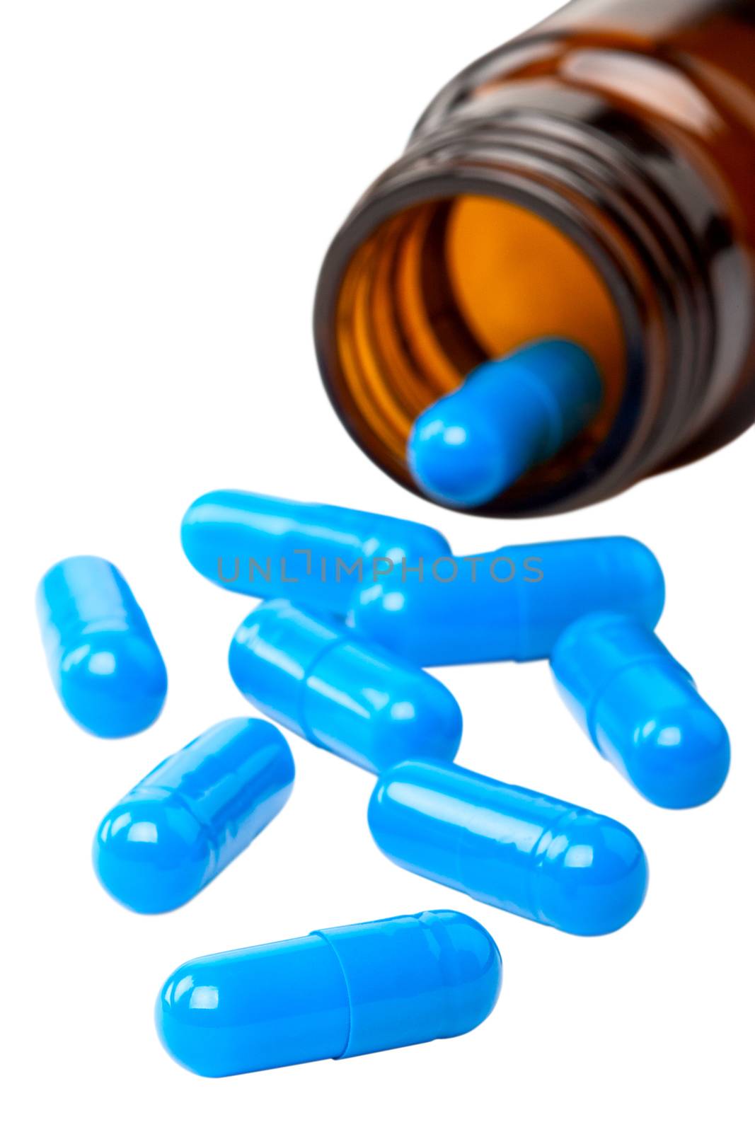 blue capsules on a white background