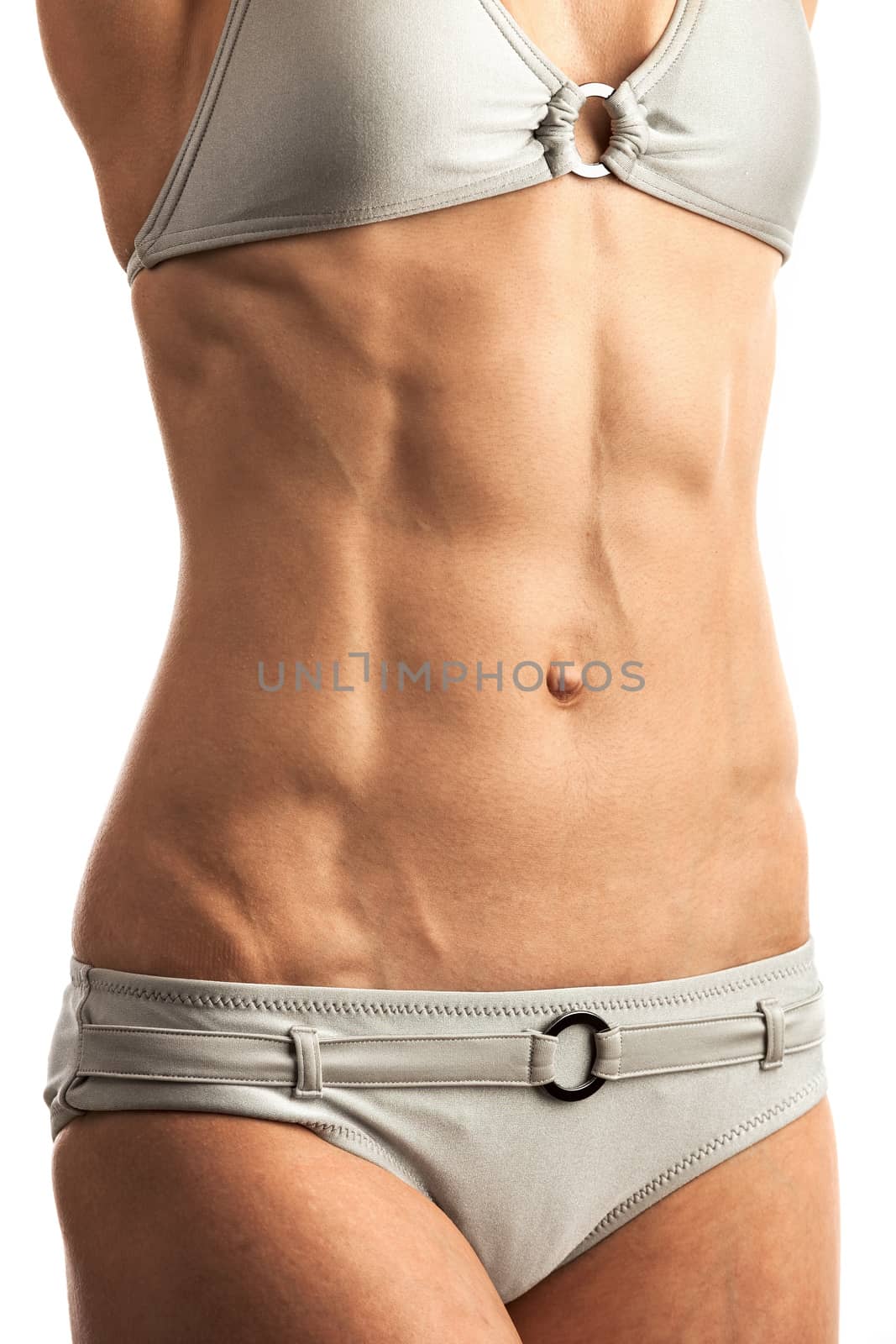 Cropped view of young fitness woman over white background