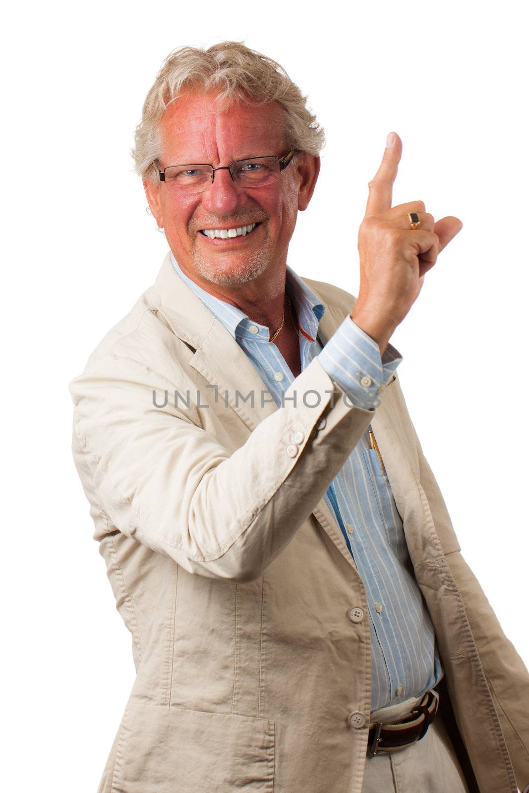 A happy mature business man pointing up at copy-space. Isolated on white.