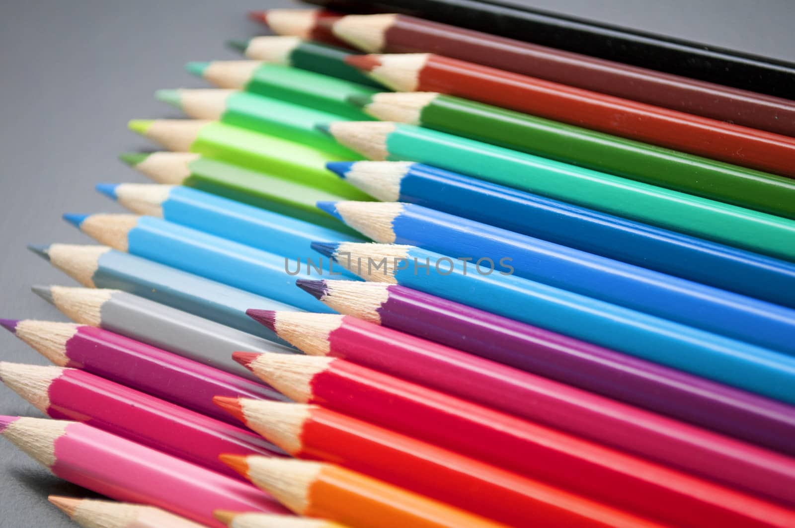pattern line of colorful wooden pencils crayons