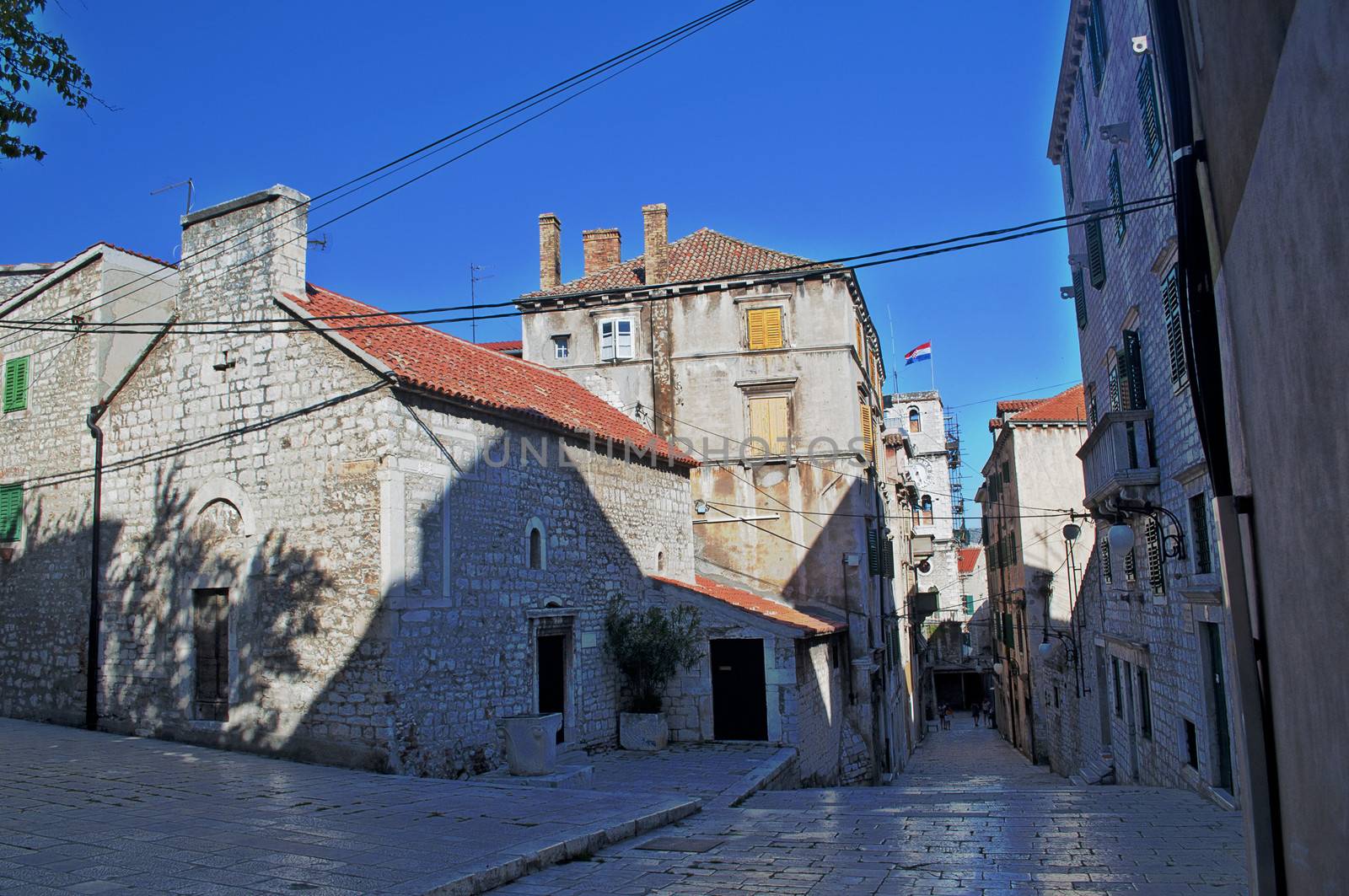 old stone square in Sibenik, Croatia by aletermi