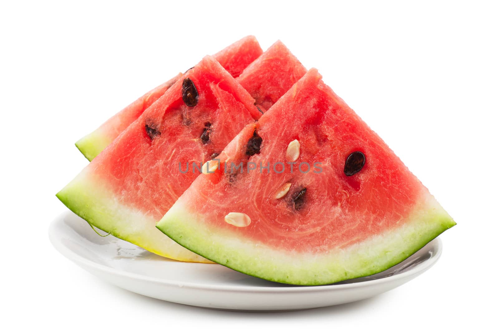 Macro view of fresh watermelon slices on a white plate
