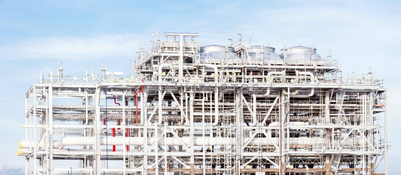 Panorama Assembling of liquefied natural gas Refinery Factory with LNG storage tank using for Oil and gas industry background